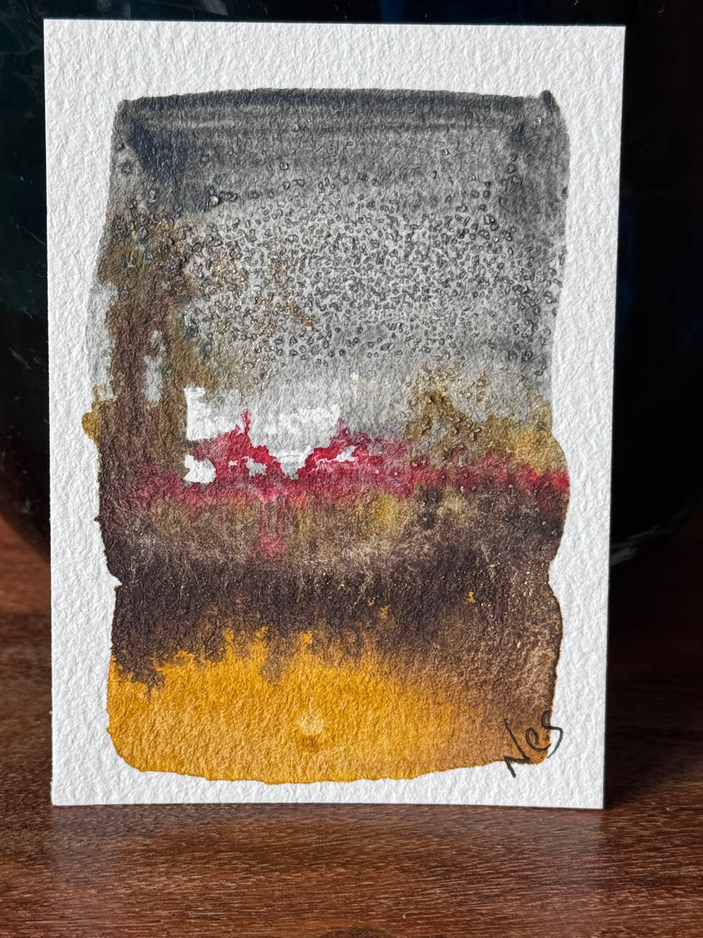 Between Ash and Gold