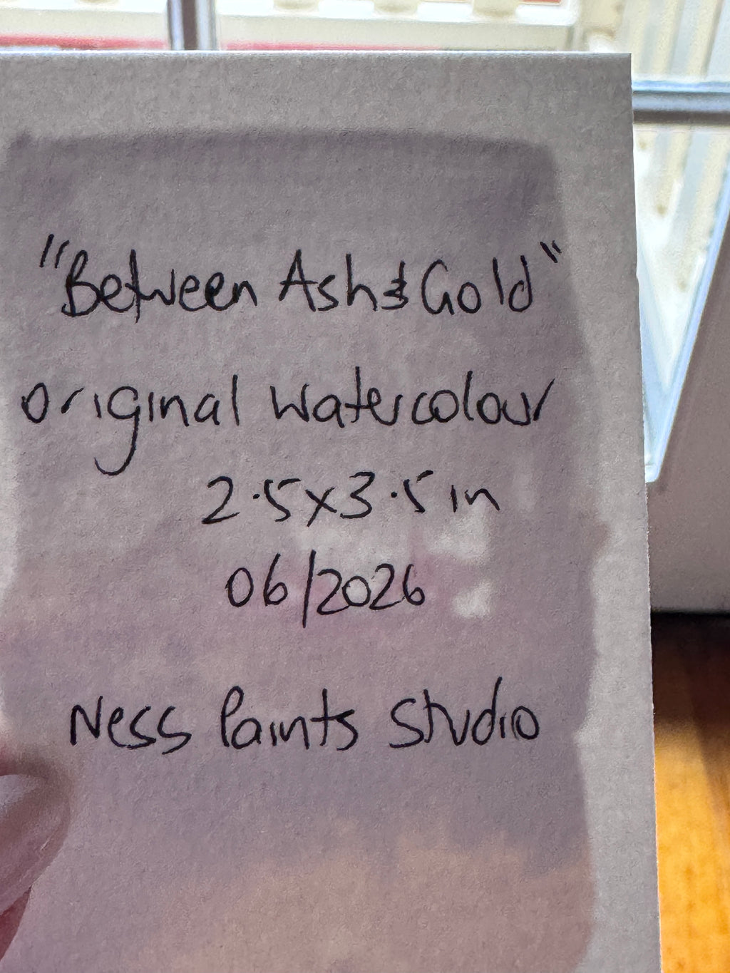 Between Ash and Gold